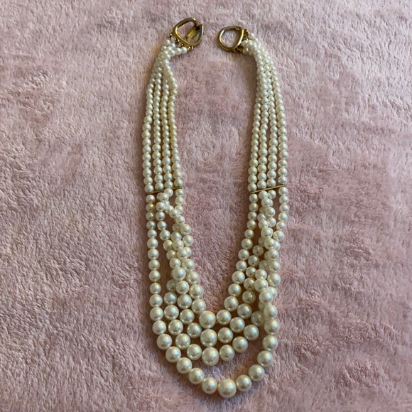 Jewelry - Four strands of faux pearls connected